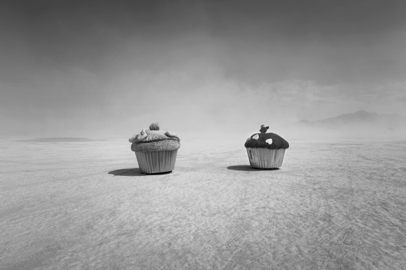 A pair of cupcake mobiles cruise the desert at Burning Man 2013 by Bill Hornstein